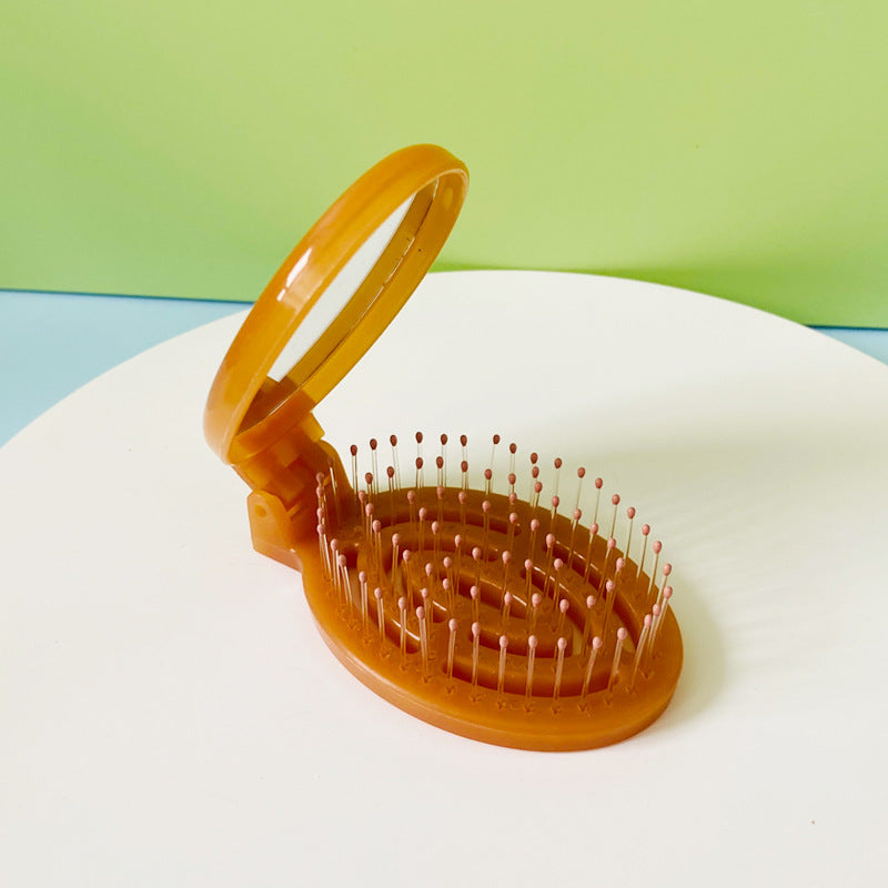 Tragbarer, faltbarer Massagekamm mit Luftkissen für den Haushalt