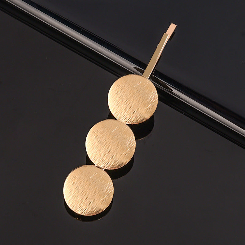 Haarspange mit Hohlbuchstaben