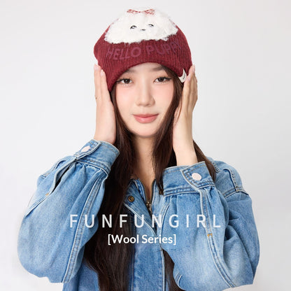 Niedliche, gestrickte Damenmütze aus Wolle mit Plüschwelpenmotiv