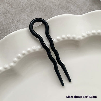 Modischer Dutt, lässige Hochsteckfrisur, Gadget: Haarkamm, Haarnadel