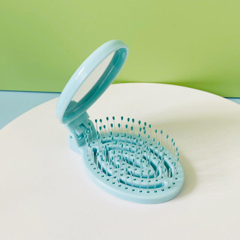 Tragbarer, faltbarer Massagekamm mit Luftkissen für den Haushalt