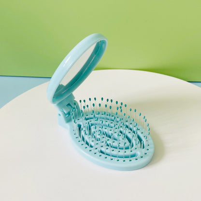 Tragbarer, faltbarer Massagekamm mit Luftkissen für den Haushalt