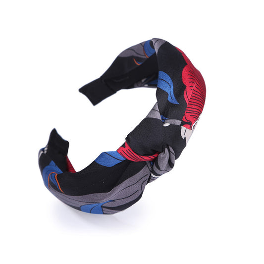 Einfaches, breitseitiges, geknotetes Stirnband zum Gesichtwaschen