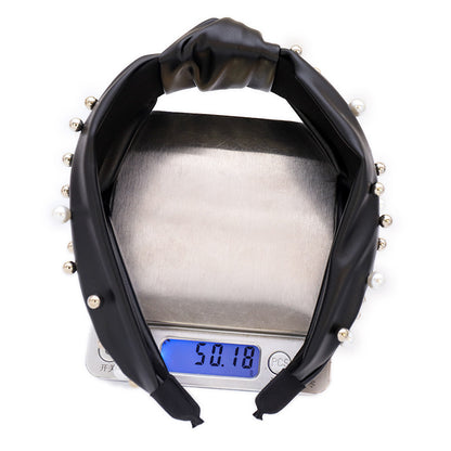 Modisches Haarband aus Leder und Perlen