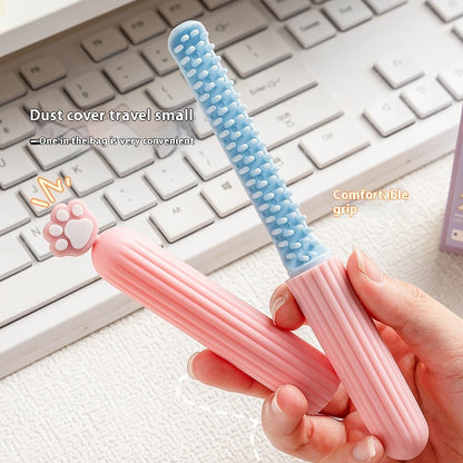 Kleiner Kamm aus der Serie „Niedliche Cartoon-Katzenpfote“