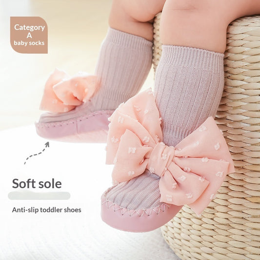 Babyschuhe und Socken, rutschfeste Lauflernsocken mit Ledersohle und Schleifenverzierungen