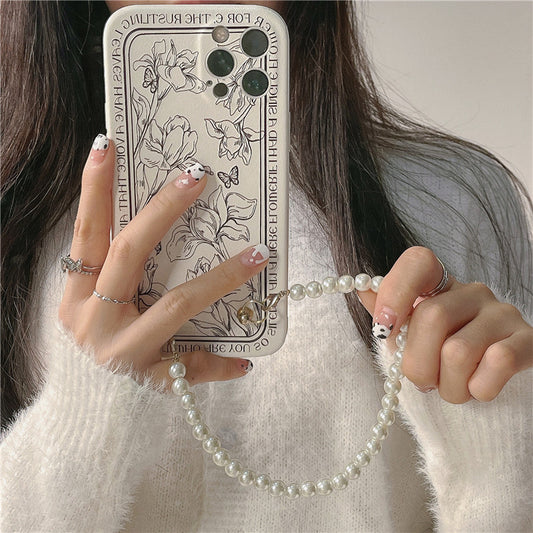 Handyhülle mit Blumen- und Perlenkette