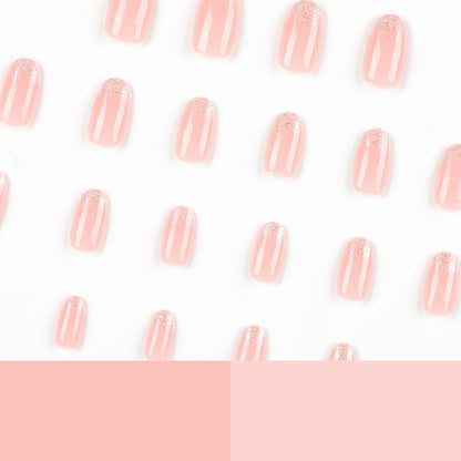 Kurze, ovale Glitzer-French-Maniküre – ein perfektes Nageldesign