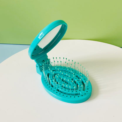 Tragbarer, faltbarer Massagekamm mit Luftkissen für den Haushalt