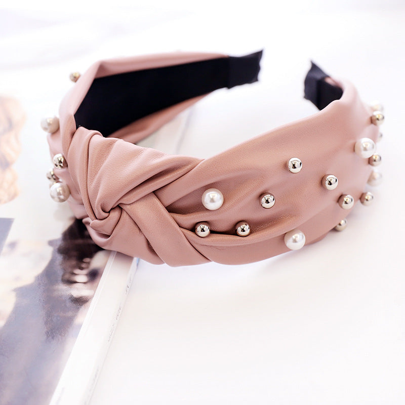 Modisches Haarband aus Leder und Perlen