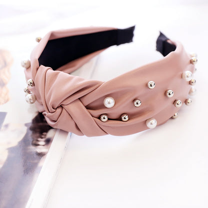 Modisches Haarband aus Leder und Perlen