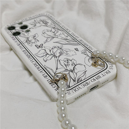 Handyhülle mit Blumen- und Perlenkette