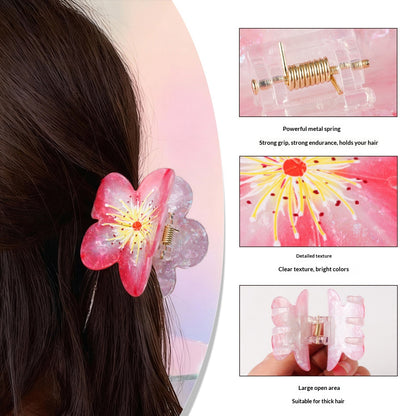 Süße Pflaumenblüten-Feenfrisur im floralen Hochsteckfrisur-Stil mit Haifisch-Haarspange – passend für alle Damen.