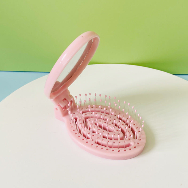 Tragbarer, faltbarer Massagekamm mit Luftkissen für den Haushalt