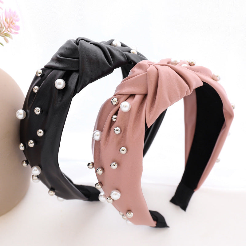 Modisches Haarband aus Leder und Perlen