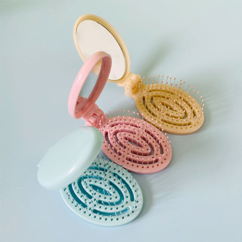 Tragbarer, faltbarer Massagekamm mit Luftkissen für den Haushalt